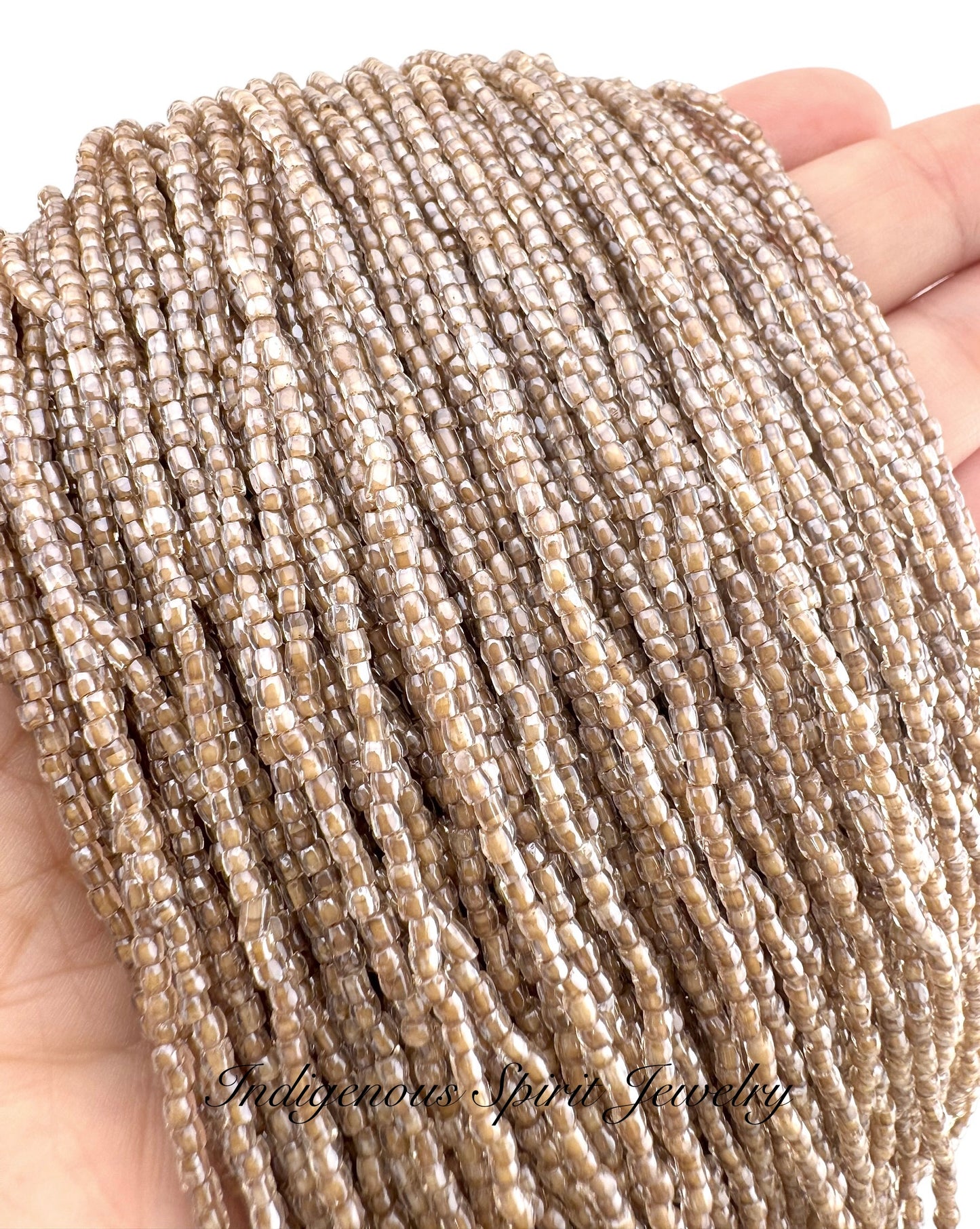 Crystal/Beige-Lined 3-cut Preciosa Czech Seed Beads (9/0)