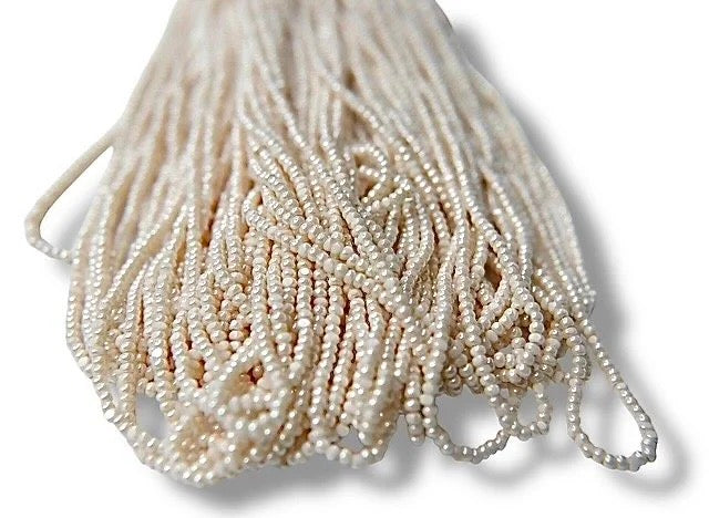 Ivory 2-Cut, Charlotte Cut Beads