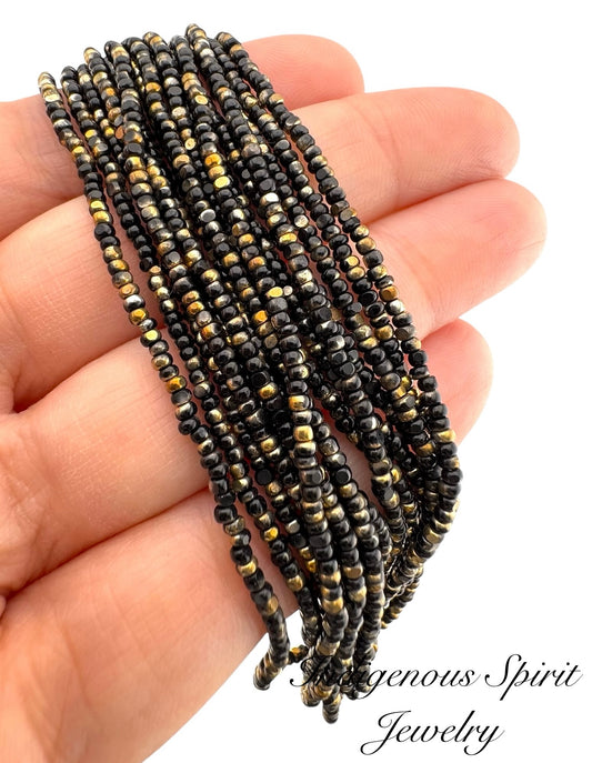 Patina Jet Black Bronze Gold - Sheen 2 Cut Charlotte Cut Beads (11/0)