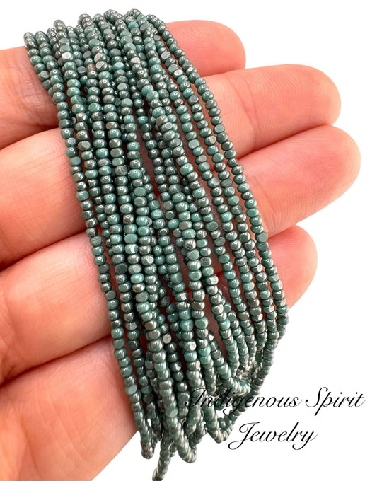 Ionized Opaque Aqua Green - Sheen 2 Cut Charlotte Cut Beads