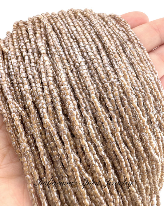 Crystal/Beige-Lined 3-cut Preciosa Czech Seed Beads (9/0)