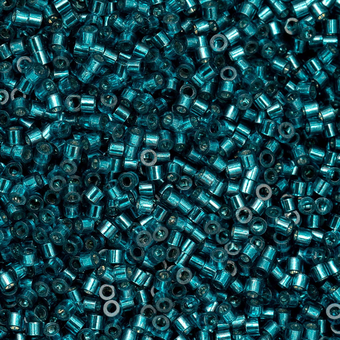 Blue Zircon Silver Lined Cylin Beads - 25g Bag