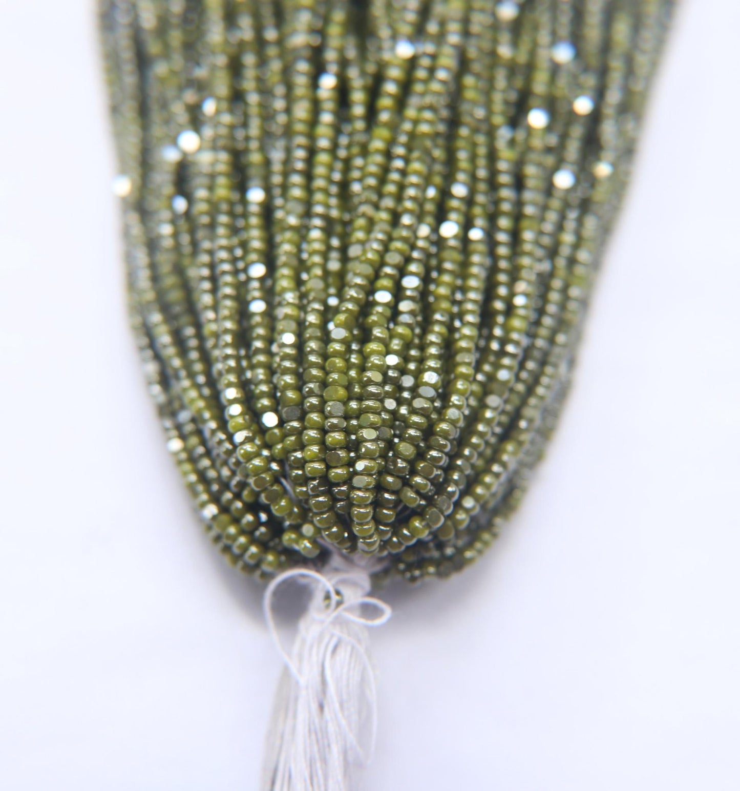 Ionized Opaque Olivine - Sheen 2 Cut Charlotte Cut Beads (11/0)